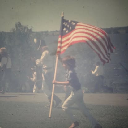 Hans Wilder owner of The Watertown Post as a young lad participating in the battle of Sackets Harbor reenactment.