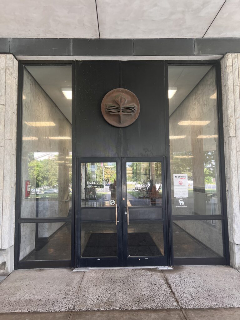 Closed and locked modern marble entrance