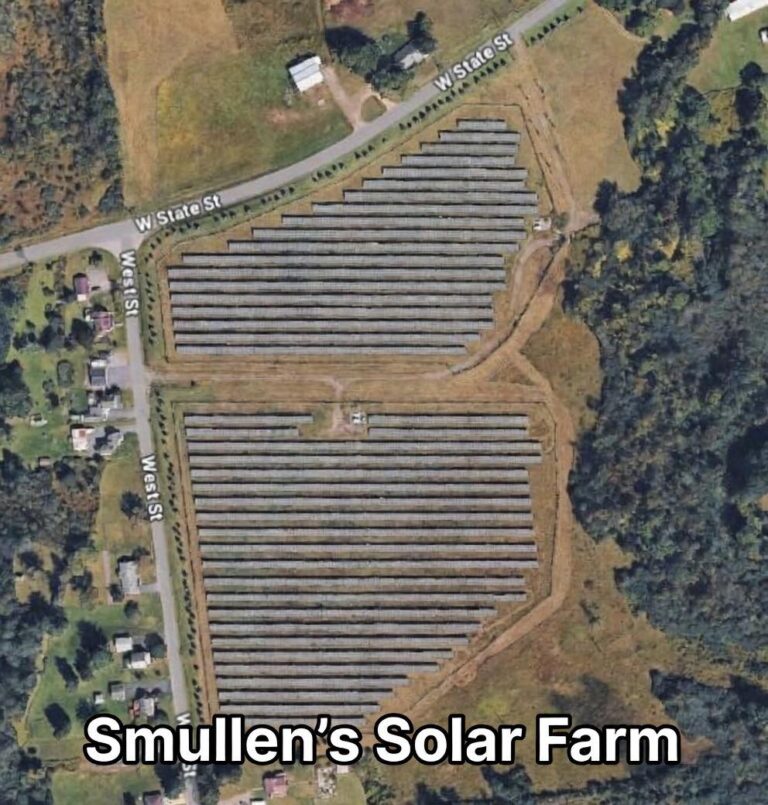 Google Earth satellite view showing solar panels installed on rural property associated with New York Assemblyman Robert Smullen in upstate New York.