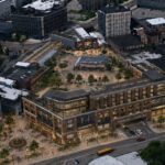 Aerial concept rendering of a modern mixed-use redevelopment in downtown Watertown, New York, showing a large brick-and-glass building surrounding an expansive public plaza with trees, seating, and walkways. The plaza extends around the east side of the building, while a roadway enters a ground-level parking garage integrated into the structure.
