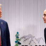 President Donald Trump speaks with Canadian Prime Minister Mark Carney during a meeting.